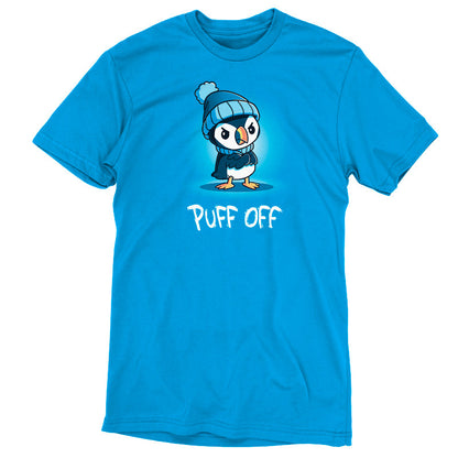 Premium Cotton T-shirt_TeeTurtle Puff Off cobalt blue t-shirt featuring a grumpy puffin wearing a hat and scarf with a pun underneath.