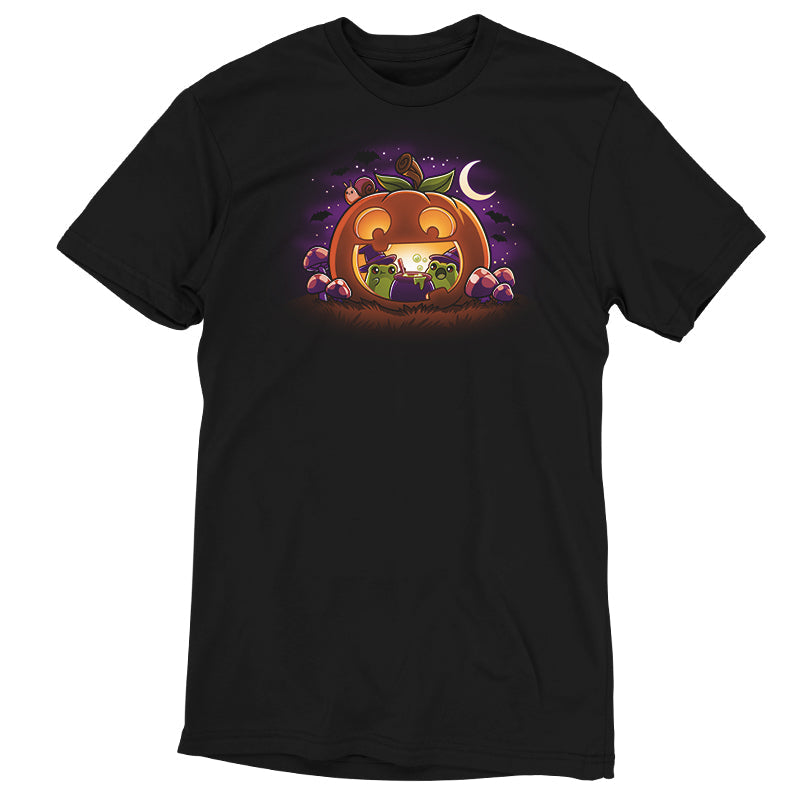 Premium Cotton T-shirt_TeeTurtle Pumpkin Frog Witches black t-shirt featuring two frogs wearing witch hats brewing a cauldron of potion inside of a happy Halloween jack-o-lantern.