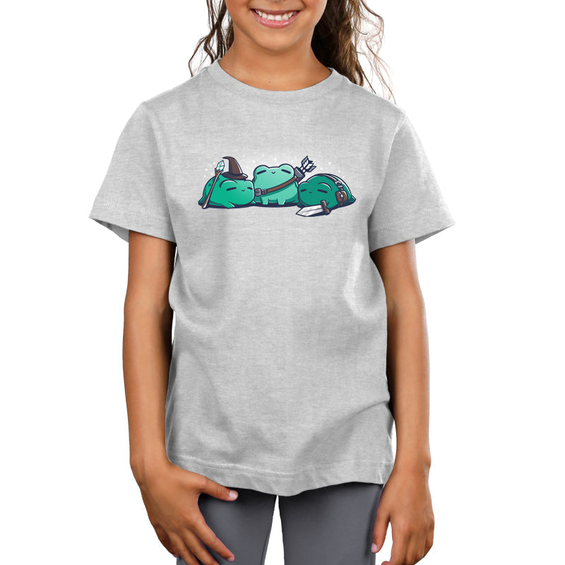 Premium Cotton T-shirt - A young girl wearing a light gray kids apparel featuring a cartoon graphic of three green frogs lounging and carrying small items, called RPG Frogs by monsterdigital.