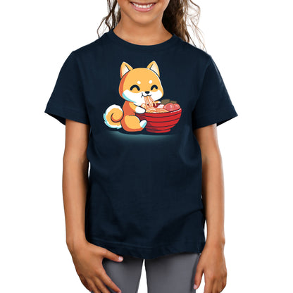 Premium Cotton T-shirt_The Ramen Shiba design from monsterdigital features a cute cartoon Shiba Inu dog happily eating a large bowl of ramen noodles with various toppings, all printed on a super soft ringspun cotton navy blue apparel. The dark background adds an extra charm to this cozy and stylish tee.