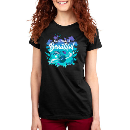 Premium Cotton T-shirt_TeeTurtle Science Is Beautiful black t-shirt featuring the phrase "Science is Beautiful," with images of whales, planets, and tropical trees surrounding Earth in a splash of vibrant blues and greens.