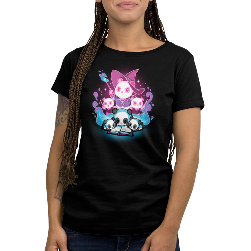 Premium Cotton T-shirt_Teeturtle Tales of Magic black t-shirt featuring a large panda wizard casting a spell, accompanied by three smaller wizard pandas, all surrounding an open book with blue, glowing pages.