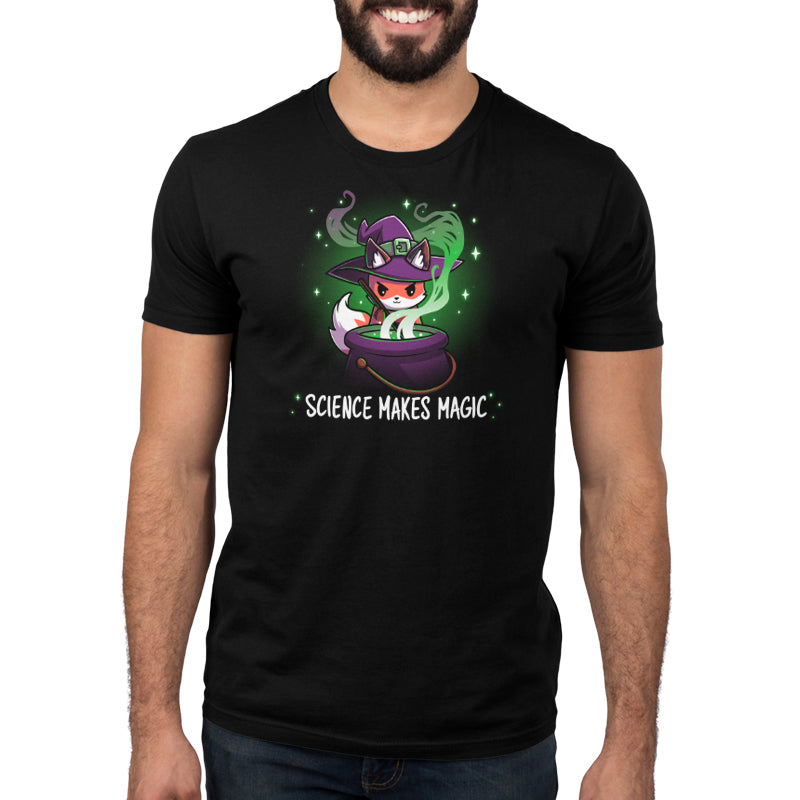 Premium Cotton T-shirt_TeeTurtle Science Makes Magic black t-shirt featuring a fantasy fox wearing a purple witch hat, stirring a cauldron with green smoke and sparkles rising. Text below reads, "SCIENCE MAKES MAGIC."