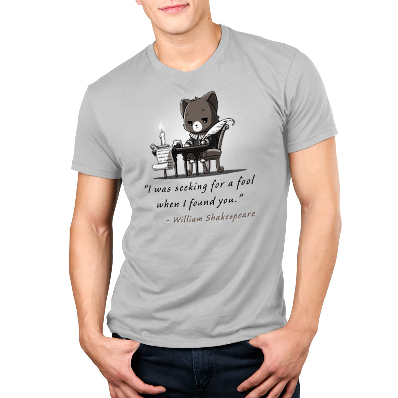 Premium Cotton T-shirt_TeeTurtle Literary Savage silver gray t-shirt featuring a gray cat dressed as William Shakespeare who sits at a desk with a quill and scroll writing. The text reads, "I was seeking for a fool when I found you." - William Shakespeare.