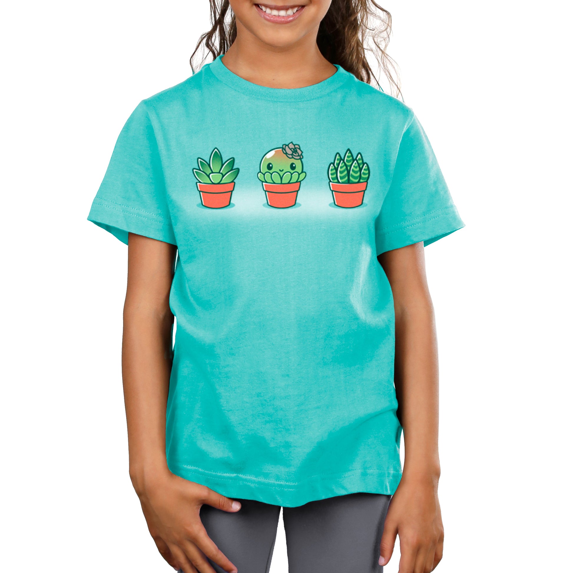 Premium Cotton T-shirt_TeeTurtle Succulent Surprise Caribbean Blue t-shirt featuring a round kawaii & sweet succulent with a flower bow in the middle of two other succulents. 