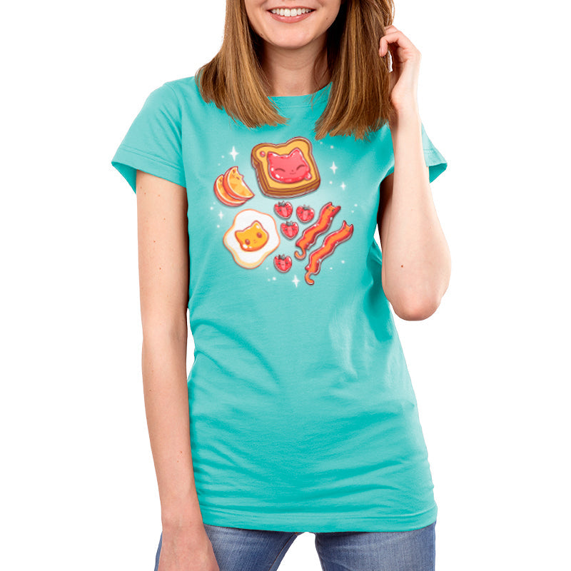 Premium Cotton T-shirt_Teeturtle The Purrfect Breakfast Caribbean blue t-shirt featuring cute cat faces on popular breakfast items, including a piece of toast, an egg, strawberries, and bacon, all on a teal background with sparkles.