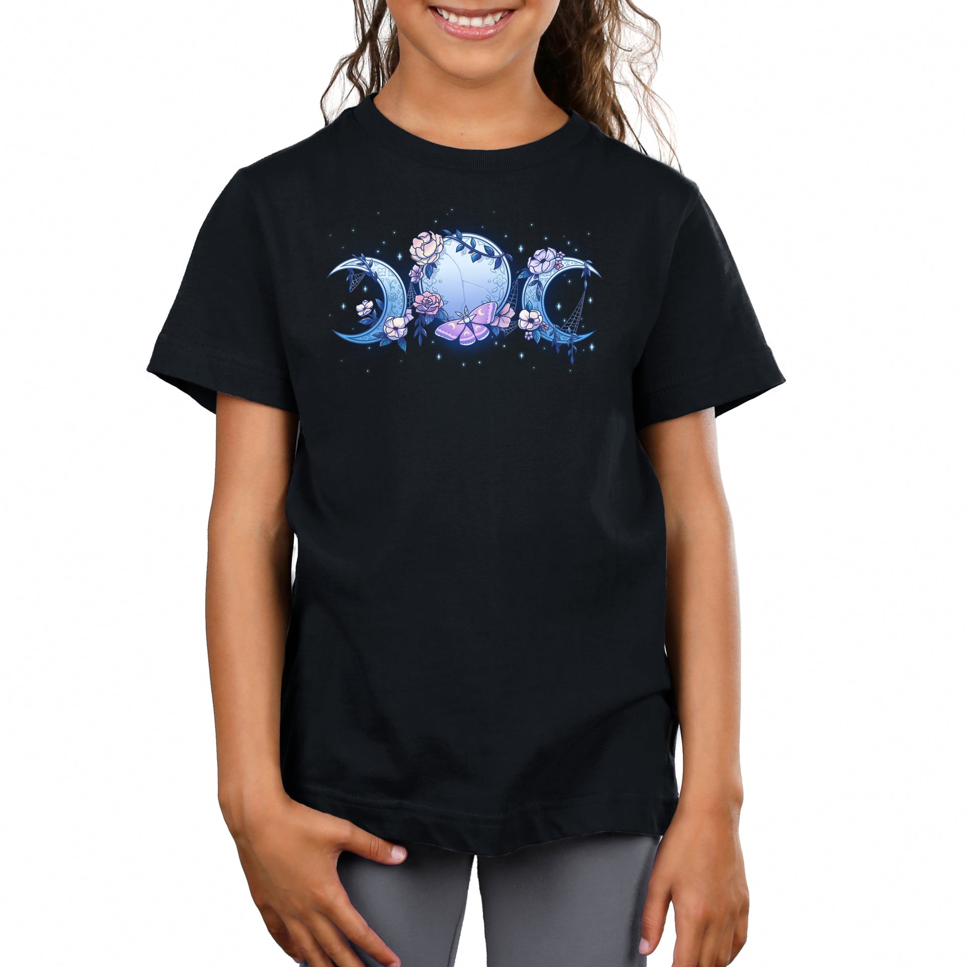 Premium Cotton T-shirt_TeeTurtle black Enchanted Moons featuring a full moon surrounded by crescent moons on each side with flowers, cobwebs, and a moth.