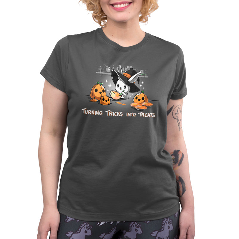 Premium Cotton T-shirt_TeeTurtle Turning Tricks Into Treats charcoal gray t-shirt featuring a cheerful bunny baking while wearing a witch's hat and surrounded by carved pumpkins and pumpkin pies.