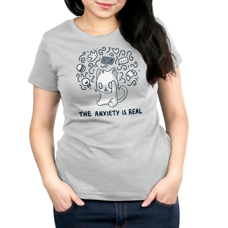 Premium Cotton T-shirt_Teeturtle The Anxiety is Real Silver Gray Featuring an anxious white cat holding its head while imagining all the various things it's anxious about with the image set above the words 'The Anxiety is Real'.