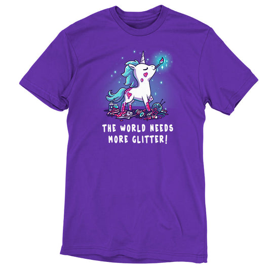 Premium Cotton T-shirt_TeeTurtle The World Needs More Glitter Purple t-shirt featuring a white unicorn holing a paint brush in it's mouth with a blue mane and tail, standing proudly above an assortment of craft supplies. It's covered with patches of pink glitter, one of which is shaped like a heart. Beneath it are the words 