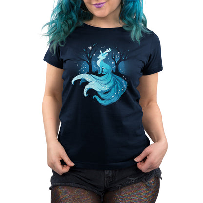 Premium Cotton T-shirt_TeeTurtle Winter Kitsune navy blue t-shirt featuring a blue, fox-like creature with antlers, long tails, and a flowing mane sitting in a snowy forest with bare trees.