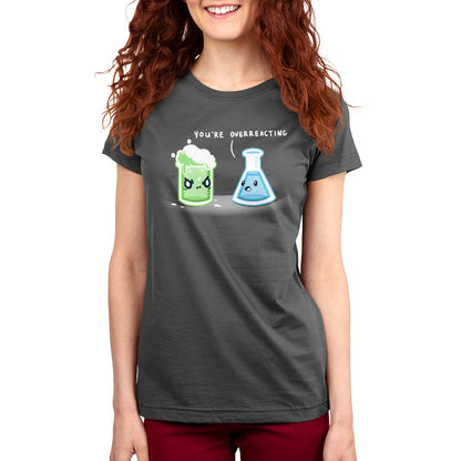 Premium Cotton T-shirt You're Overreacting charcoal gray t-shirt featuring a green beaker with an angry expression and foam spilling out, and a blue conical flask with a calm expression.
