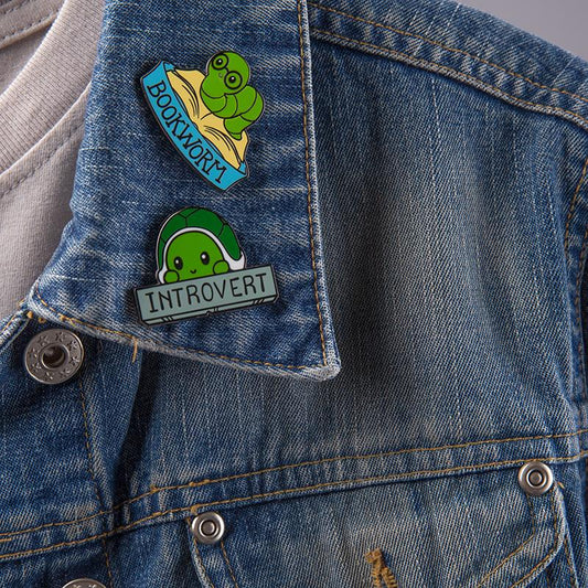 A TeeTurtle jacket adorned with Introvert Pins.