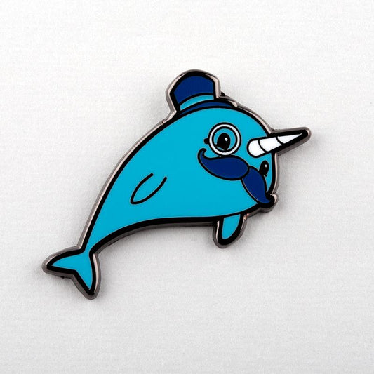 A Classy Narwhal Pin from TeeTurtle, with a mustache, made of blue enamel.