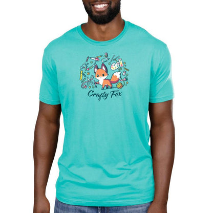 Premium Cotton T-shirt_TeeTurtle Crafty Fox caribbean blue t-shirt featuring a cute fox holding a brush in its forepaw and surrounded by yarn, scissors, ribbon, paint and many other crafting items.