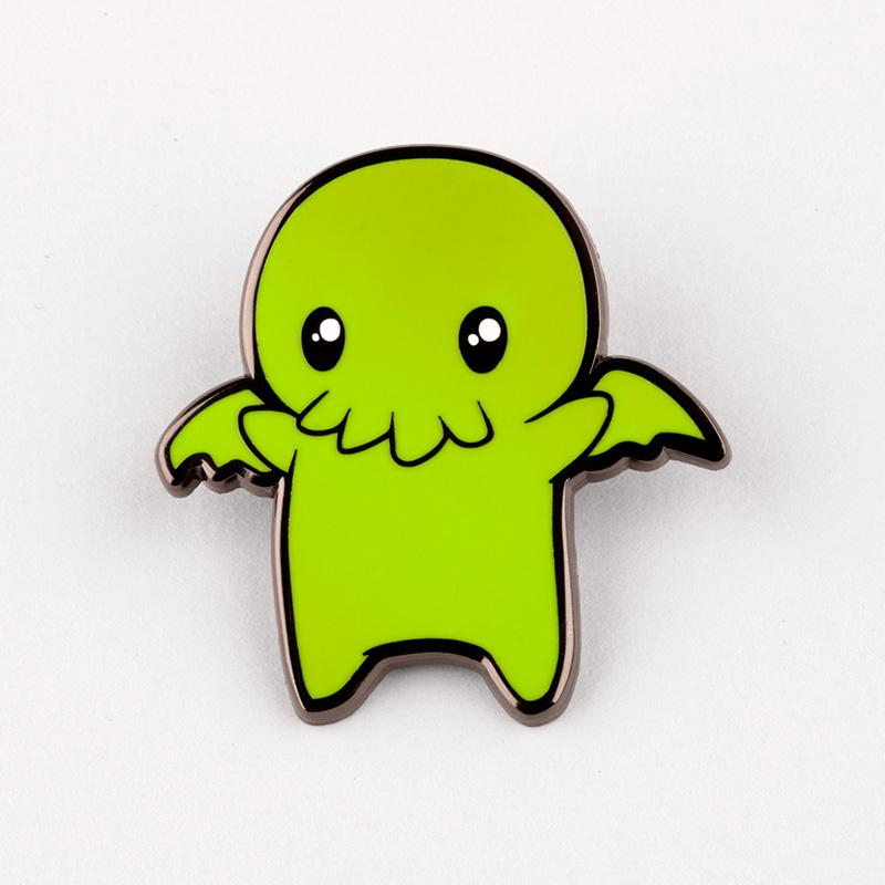 A TeeTurtle Cthulhu pin, perfect for enamel pin collectors.