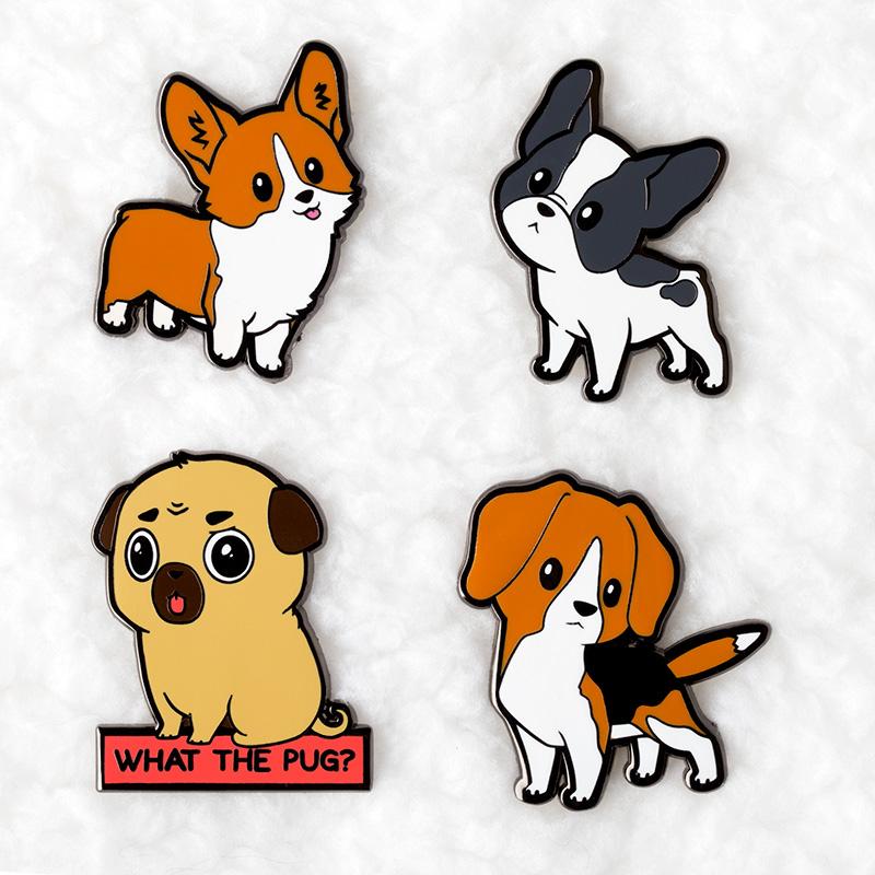 A set of TeeTurtle enamel pins featuring adorable Boston Terrier Pins.