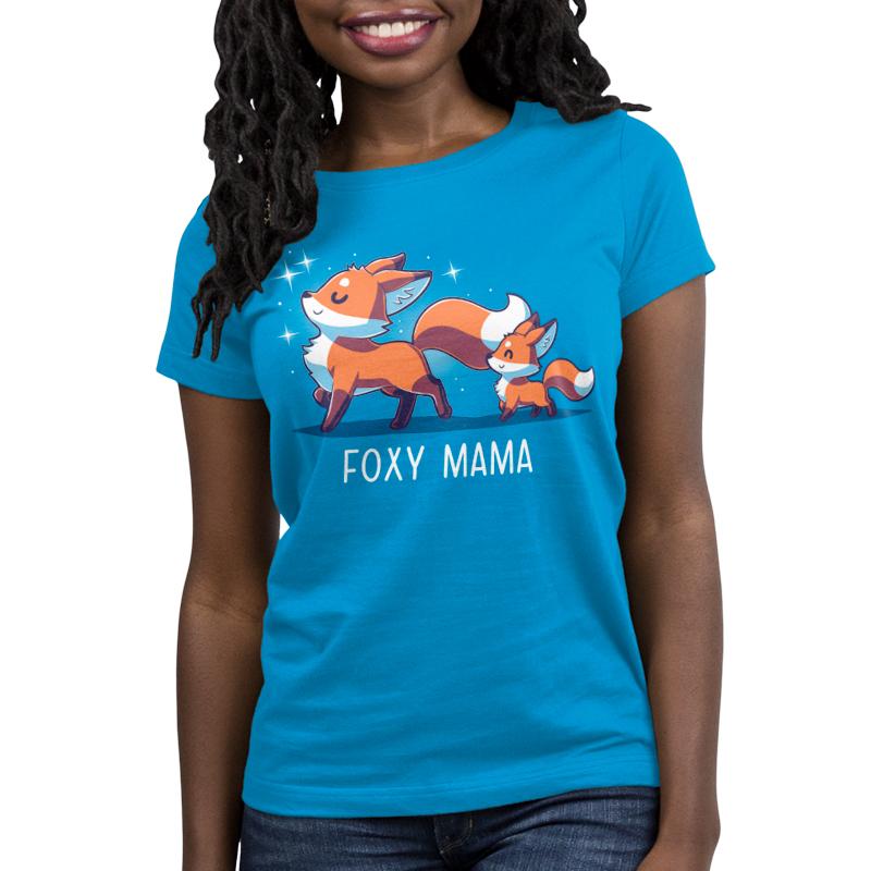 Premium Cotton T-shirt_TeeTurtle Foxy Mama cobalt blue t-shirt featuring a proud, smiling fox walking ahead with a smaller fox following.