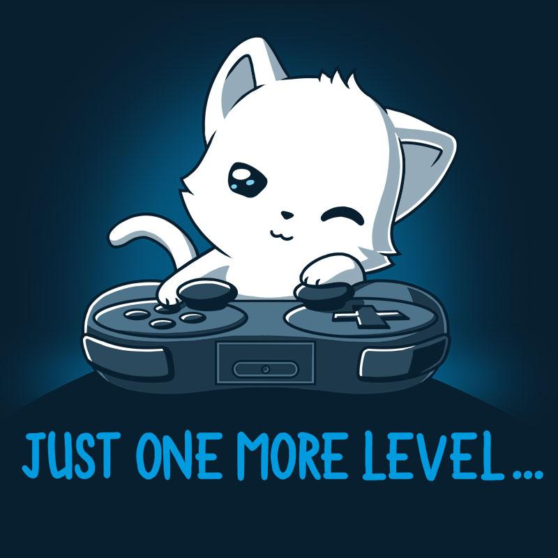 Premium Cotton T-shirt_TeeTurtle Just One More Level navy blue t-shirt featuring a cat falling asleep in front of a video game controller.