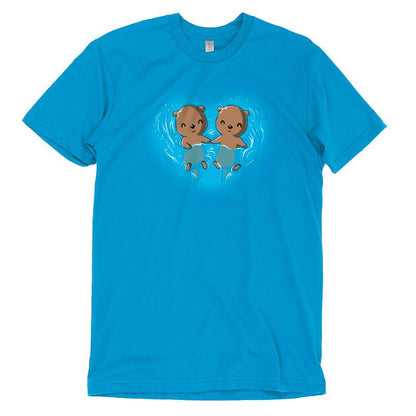 Premium Cotton T-shirt_Teeturtle My Otter Half cobalt blue t-shirt featuring two otters holding hands while floating on their backs in water, surrounded by ripples in a heart shape.