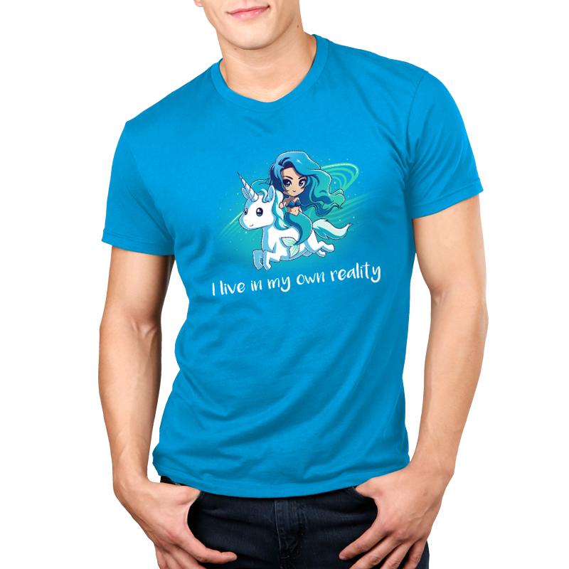 Premium Cotton T-shirt_TeeTurtle cobalt blue My Reality. Featuring a blue-haired mermaid riding a white unicorn.