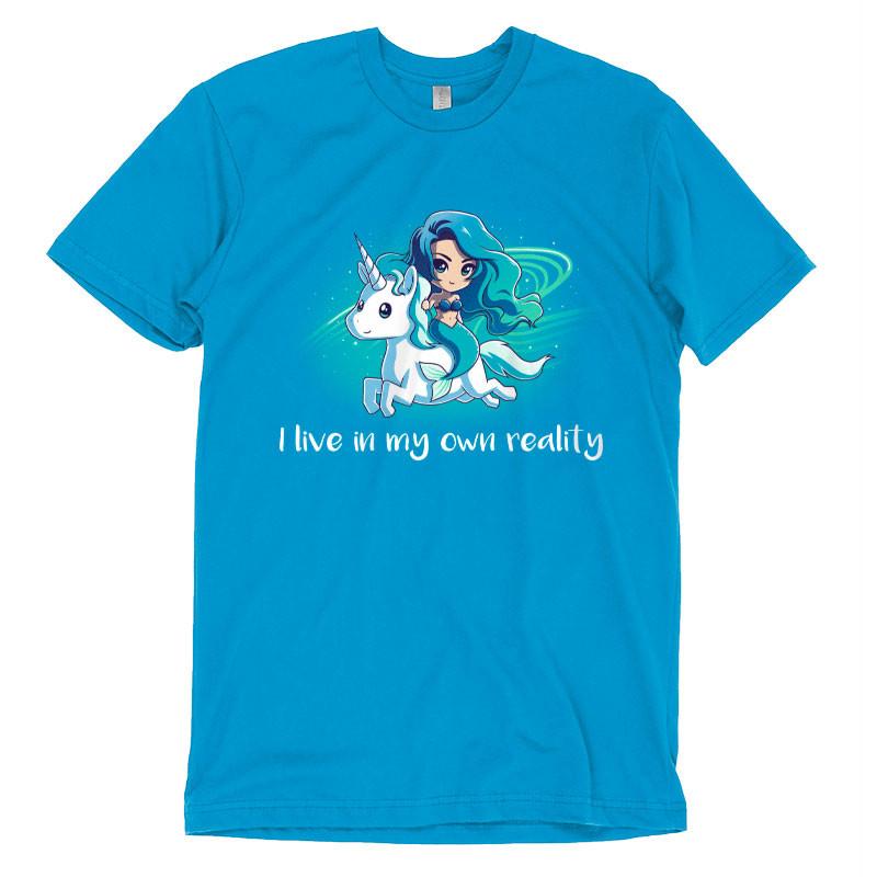 Premium Cotton T-shirt_TeeTurtle cobalt blue My Reality. Featuring a blue-haired mermaid riding a white unicorn.