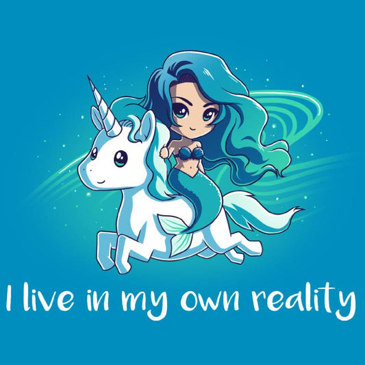 Premium Cotton T-shirt_TeeTurtle cobalt blue My Reality. Featuring a blue-haired mermaid riding a white unicorn.