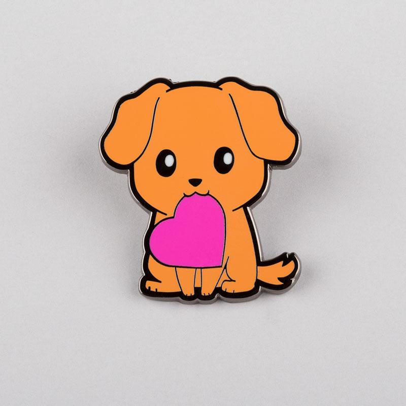 A dog wearing the TeeTurtle Puppy Love Pin and expressing love with a pink heart design.