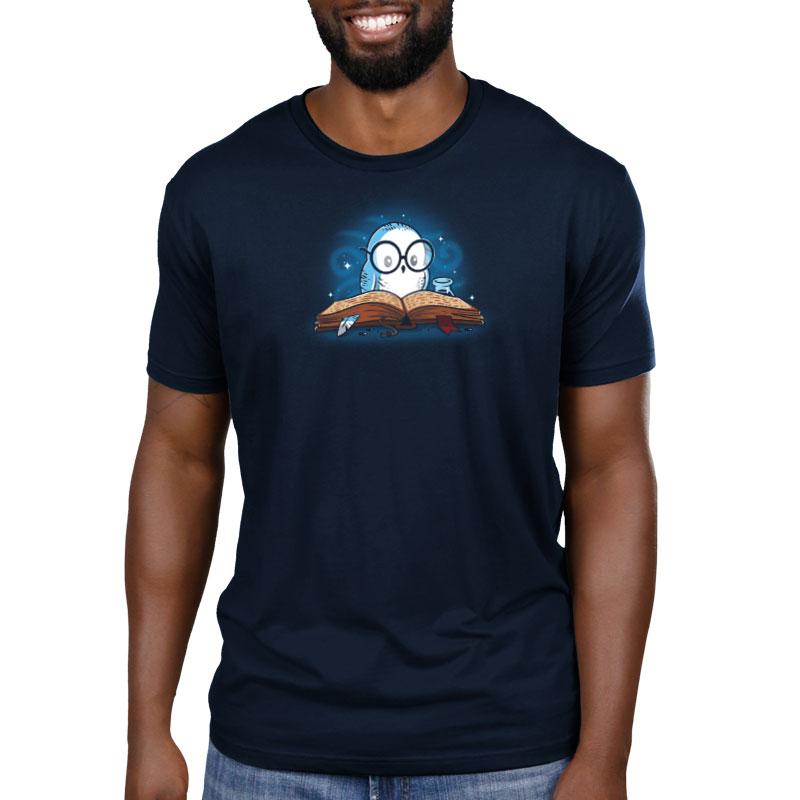 Premium Cotton T-shirt_TeeTurtle navy blue Reading is Magical. Featuring a white owl reading a book.