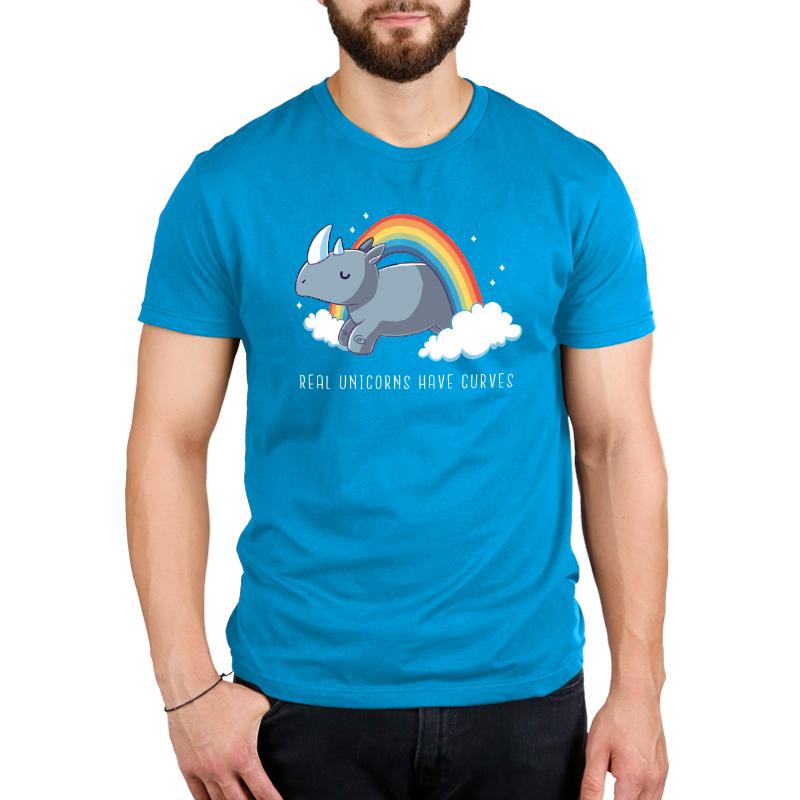 Premium Cotton T-shirt_TeeTurtle cobalt blue Real Unicorns Have Curves. Featuring a rhinoceros jumping through a rainbow arc.