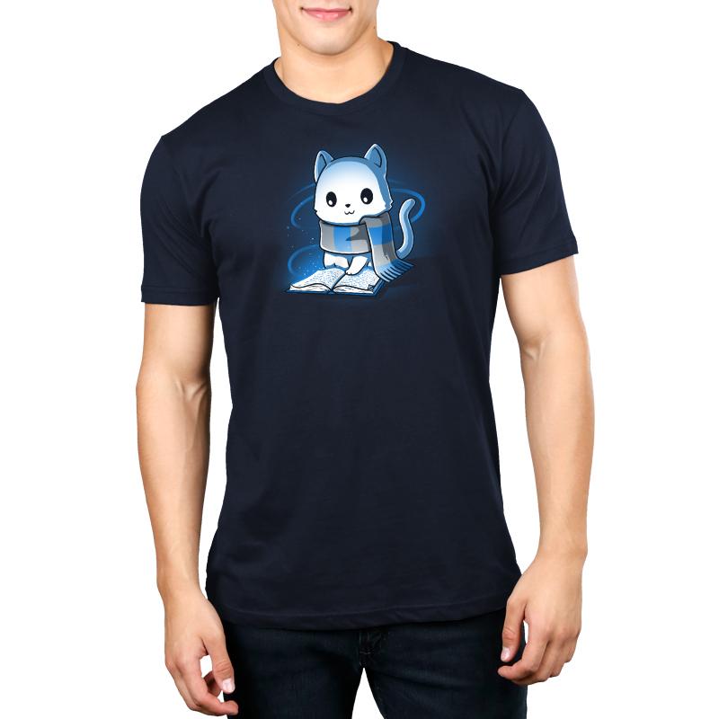 Premium Cotton T-shirt_TeeTurtle navy blue Smart Kitty. Featuring a white cat with a blue and silver striped scarf reading a book.